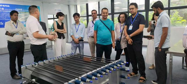 图5  国际山地组织代表团访华交流，共探全钒液流电池。（华泸集团供图）.jpg